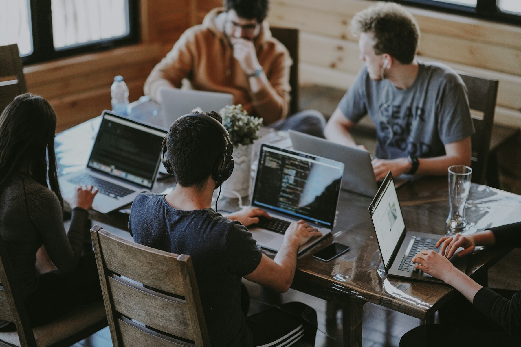 Anthropic Just Replaced Its Slack App With a Persistent AI Teammate That Lives in the Channel — Claude Tag Launched June 23 in Beta for Enterprise and Team Plans, Lets Anyone Tag @Claude to Delegate a Task and Walk Away While It Works Asynchronously for Hours or Days With Scoped Access to Tools and Data, 65 Percent of Anthropic's Own Product-Team Code Is Now Created by the Internal Version, and the Knowledge-Work Substrate Conversation Just Got a Real Answer to the Question the Chat-Window Generation Could Not Solve — How Does AI Live Inside the Team's Existing Workflow Without Forcing Every Engineer to Open a Second Tab, Re-Establish Context, and Babysit Each Turn — Here's What Lands With It for the Engineering Team, the Senior-Judgment Work the Persistent-Teammate Substrate Makes Operationally Cheap but Does Not Replace, and the Procurement Question the FY27 Knowledge-Work Stack Now Has to Answer.